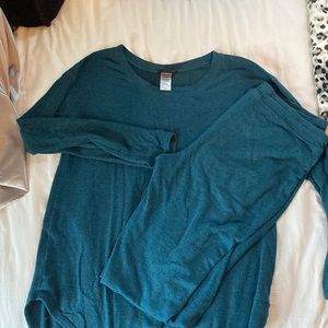 Dark blue Costco, long sleeve pajama set size medium.